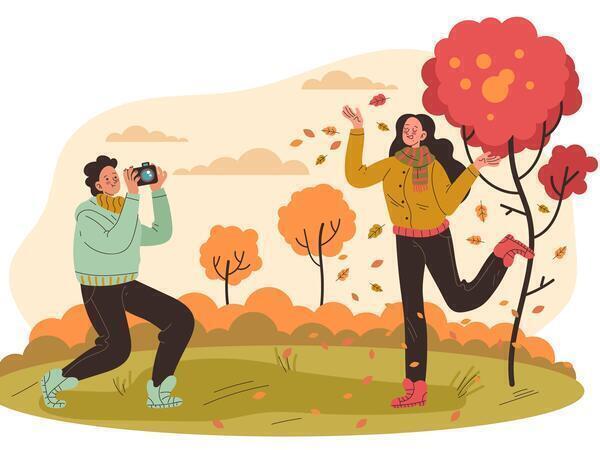 Plaatje mens met camera in de herfst